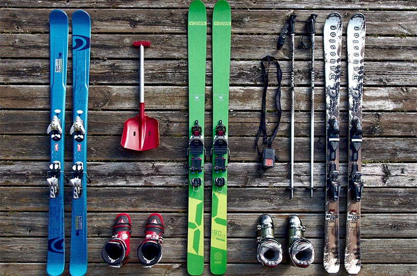 Ski equipment on wooden deck