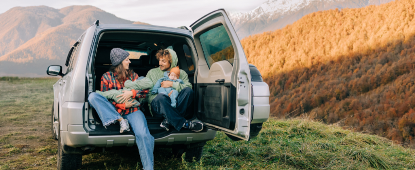 Family taking a break during a winter road trip in New Zealand