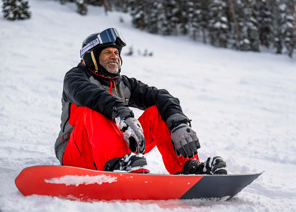 Traveller taking a break from snowboarding
